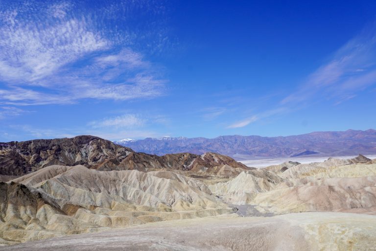 View of mountains and a dry lake bed in the background