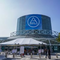 Exterior view of a building with the words "Auto Show" on it