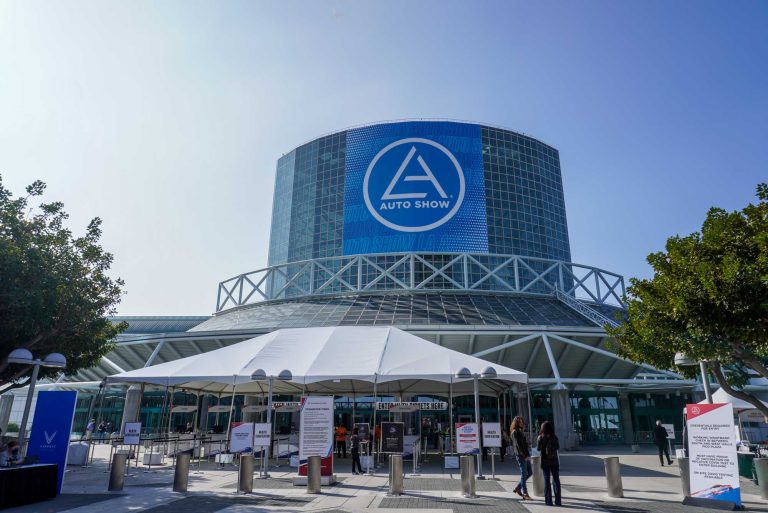 Exterior view of a building with the words "Auto Show" on it