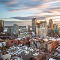 Aerial view of the Detroit skyline against a moody sky