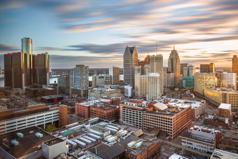 Aerial view of the Detroit skyline against a moody sky